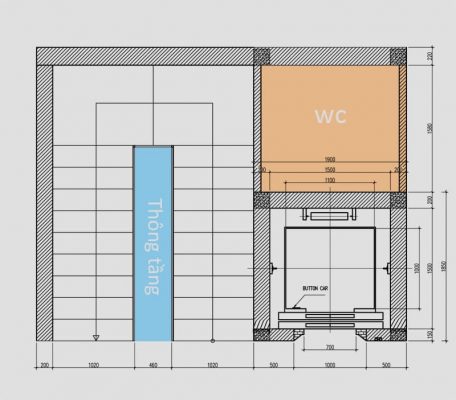 thang máy gia đình bố trí cạnh thang đi bộ và WC